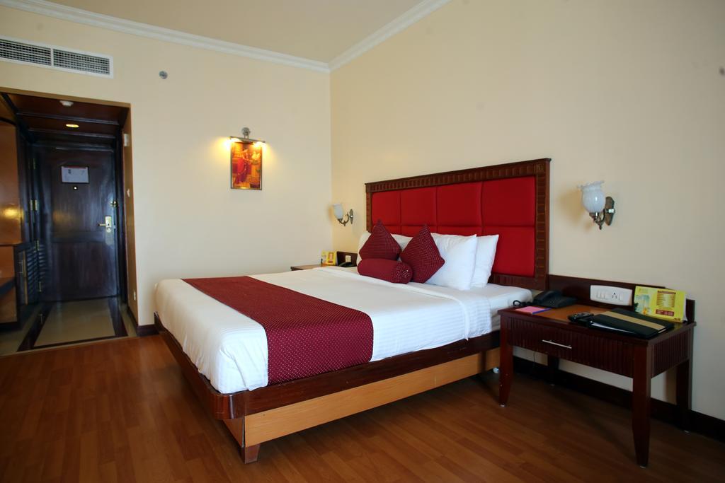 Joys Palace Hotel Thrissur Rom bilde